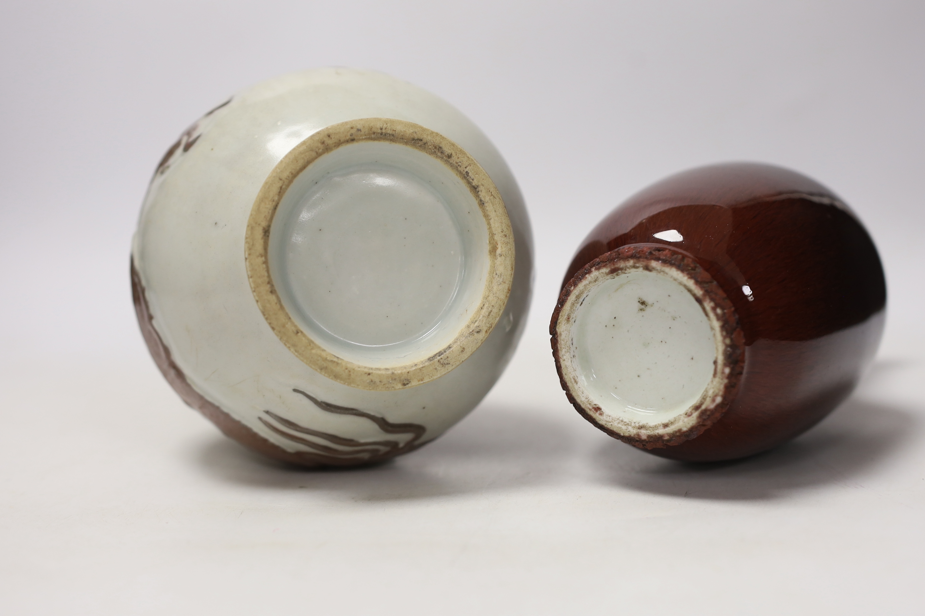 A Chinese sang de boeuf glaze vase and another copper red ‘dragon’ vase, tallest 26cm